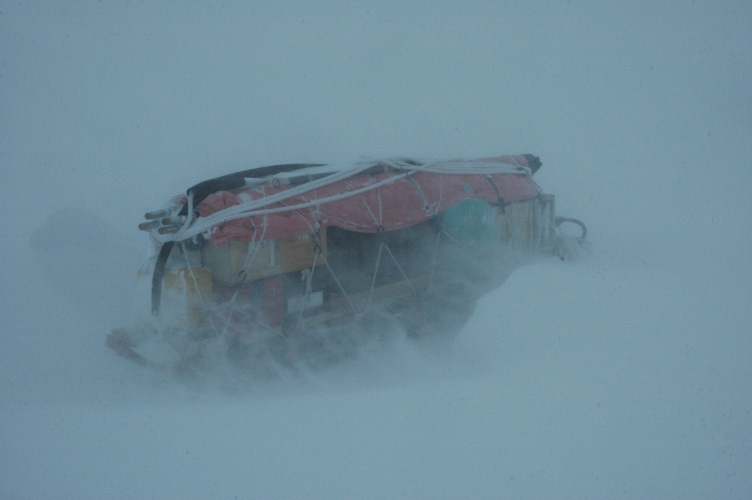 Endless Snow blows over sledges