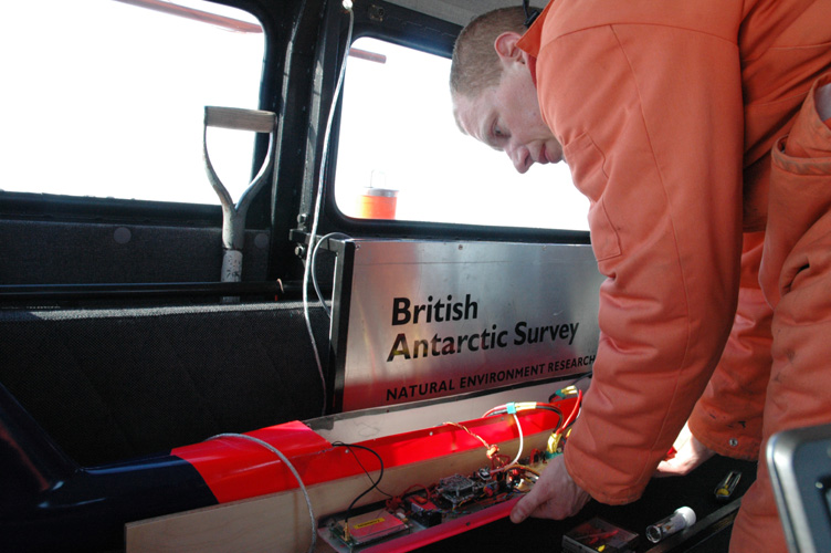 Tom prepares the UAV for a flight