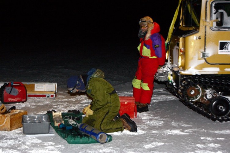 Chopping up ice cores for later structural and salinity analysis.  It's -40 and my hands hurt. (Andy)