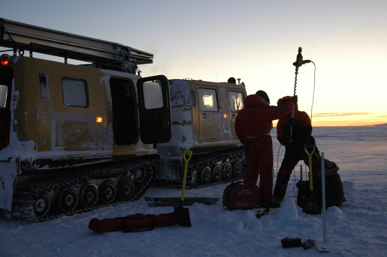 Drilling as we travel on old ice in a Hagglunds