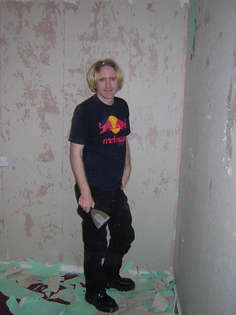 Ben stripping the bedroom